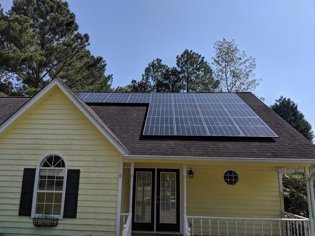 Photovoltaic Solar Panel Installation on Shingles