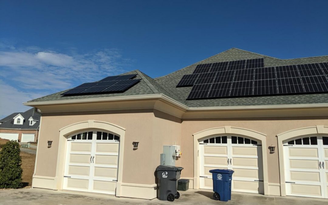 Three car garage with many solar panels