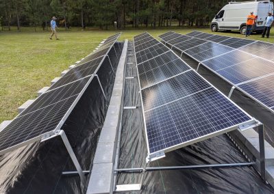 Image 3 - To keep the panels low to the ground, we used a ballasted racking system on this grid tie with battery backup system in Thomasville, Georgia.