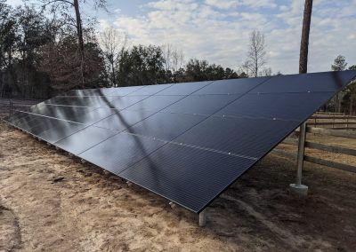 Image 2 - Large grid tie with battery backup ground mount array in Leary, Georgia.